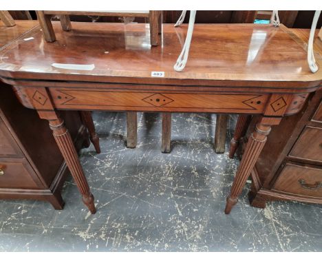 A WILLIAM IV MAHOGANY AND INLAID FOLD OVER CARD TABLE. 