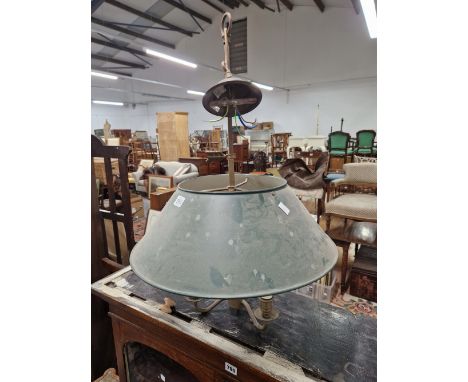 A CEILING LIGHT WITH THREE CANDLE HOLDER ELECTRIC LIGHTS BELOW AND GREEN TOLE SHADE
