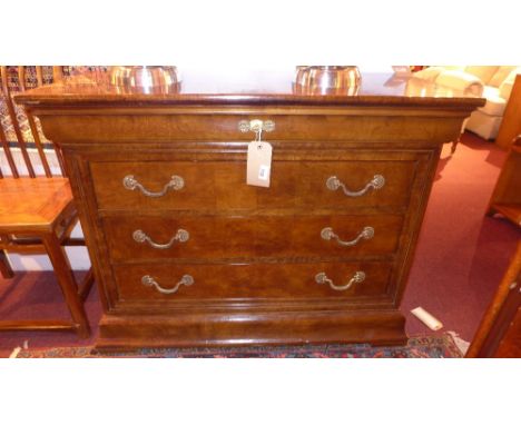 A French style walnut commode chest fitted four long drawers with gilt metal handles on plinth base