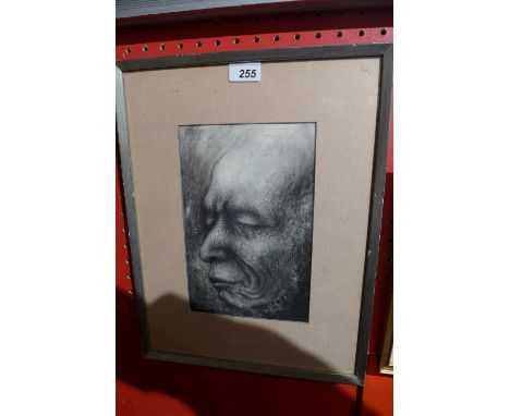 A detailed pencil portrait of a man, signed and dated 'Saito '70' in a silvered frame 