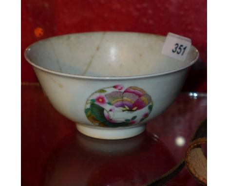 A Chinese famille rose porcelain bowl with butterfly reserves. (af)