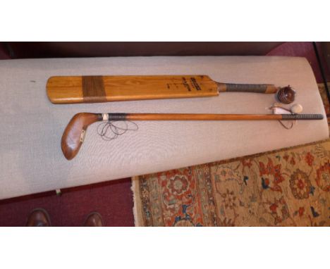A pair of golf and cricket props 