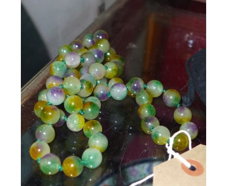A string of jade style beads