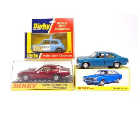 THREE DINKY DIECAST MODEL CARS  comprising a French Dinky No.1409, Chrysler 180, metallic blue, generally good condition, box