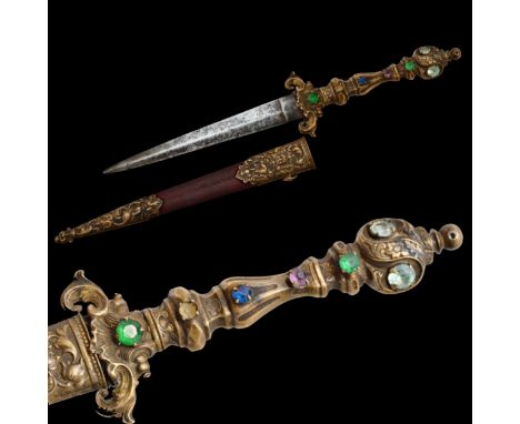 A Very high quality Dagger Renaissance Style Brass with inlaid colored stones, 19th century. Straight, double-edged steel bla