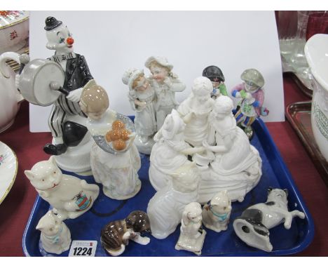 Doulton Cat, licking tail 5.5cm high, Lladro fruit seller, continental and other figurines, crested cats:- One Tray.