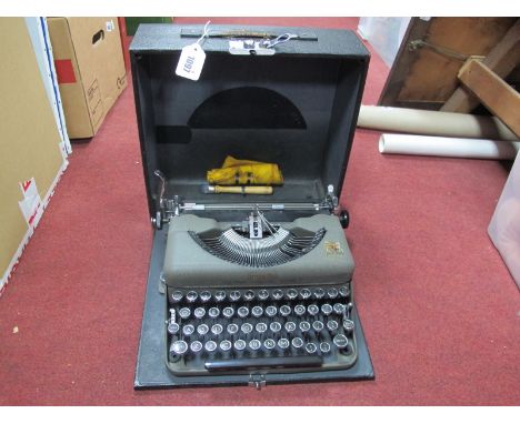 The Imperial Gold Companion Model T Typewriter.