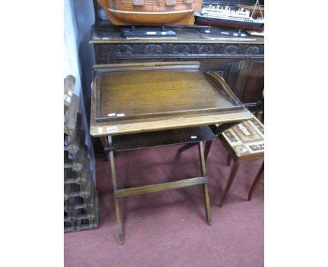 A 1930's Oak Butlers Stand, with a tray top and under shelf.