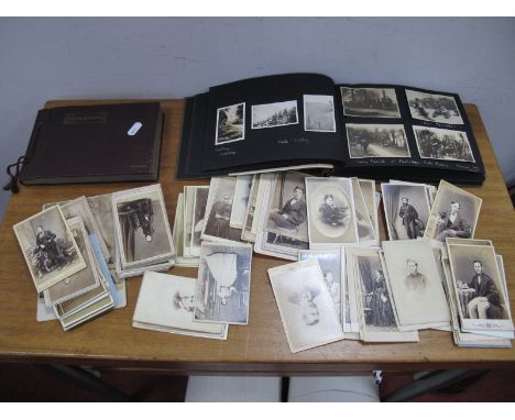 Three Photographs of Italian Young Fascists, together with Italian scenes, plus postcards, in two albums, approximately 115, 
