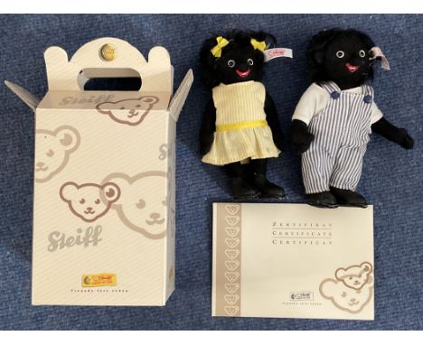 Steiff Pair of Golly kids 2005. Limited edition No 00328 of 1,500. With Original box and Certificate. Both have white and red