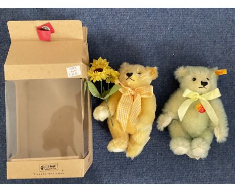 Steiff Teddy bears. 2 bears in collection. Yellow and blue bears. Both have tags on left foot. Yellow and red ear tag with go