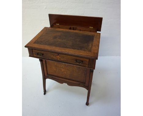 EDWARDIAN INLAID ROSEWOOD DAVENPORTwith a lift and slide up rear lid to the top opening to reveal a fitted interior, the fron