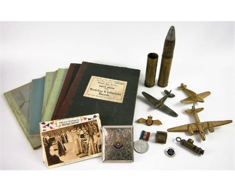 RAF workshop and laboratory records, two brass ordnance shells and three miniature aircraft, gilt metal badge, etc.