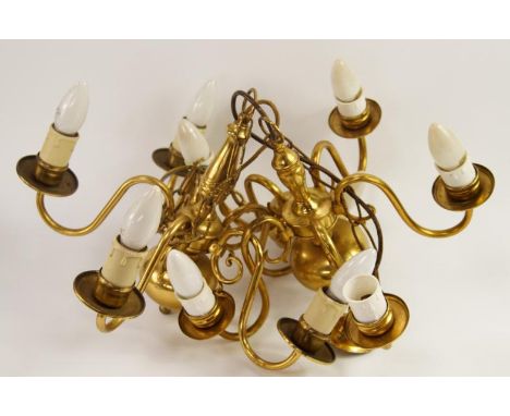 A pair of brass five branch pendant light fittings. 