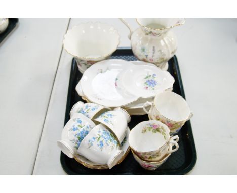 A Royal Albert Forget Me Not pattern tea service, etc (2 trays).
