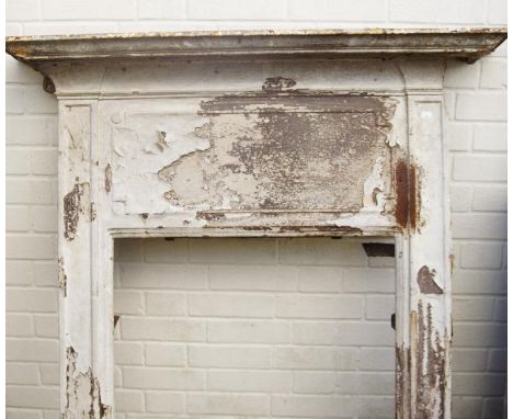 A cast metal fire surround, (AF).