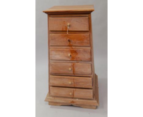 An Indonesian light figured hardwood tapered chest, of six drawers, 106cm high.