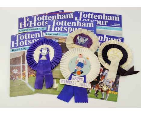 A collection of Tottenham Hotspur football programmes, dating from 1960s 1970s and later, also some rosettes from the same pe