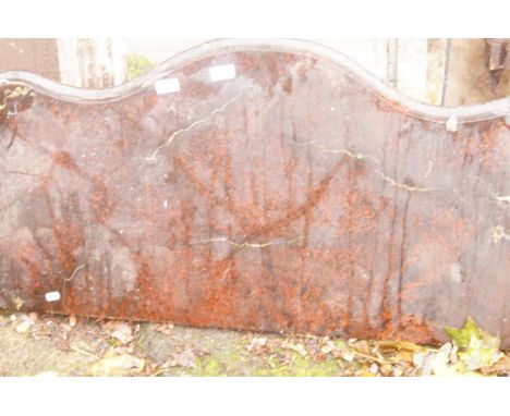 A rouge marble serpentine commode top.