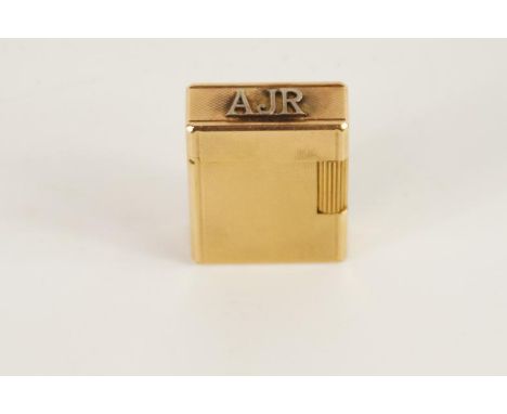 A Dupont rolled gold cigarette lighter, with engine turned case, and with initials AJR.