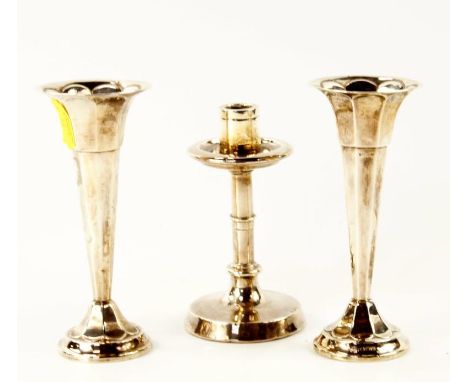 A pair of George V silver bud vases, together with a small silver spill stick, all with loaded bases, the vases Sheffield 191