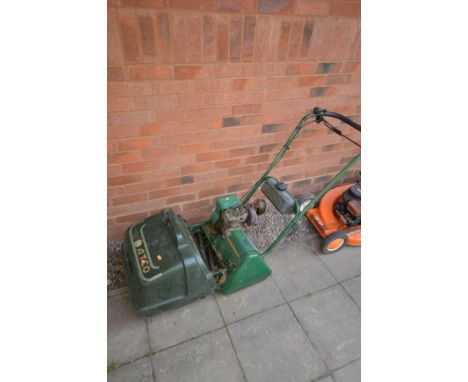 AN ATCO COMMODORE B14 PETROL CYLINDER LAWNMOWER with grass box (engine seized)