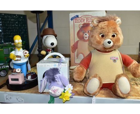 A TEDDY RUXPIN ANIMATED TOY, circa 1985, complete with one cassette box and instructions, untested (batteries have leaked int