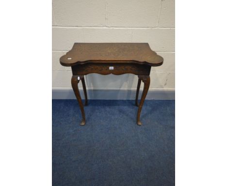 A GEORGIAN OAK FOLD OVER CARD TABLE, floral carving on tall cabriole legs, width 77cm x depth 38cm x open depth 77cm x height