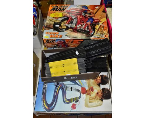 A MATCHBOX POWERTRACK PLUS PP-3000 RACING CAR GAME, complete with two cars, track, transformer and controllers, some smaller 