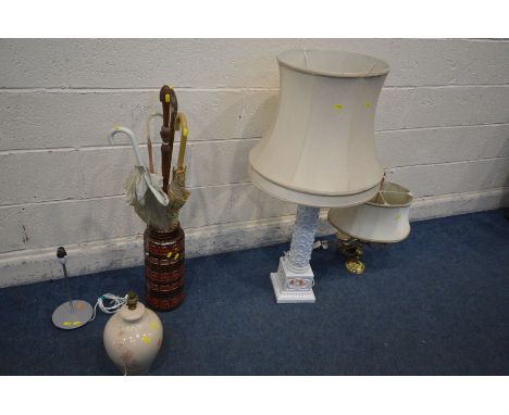 A WHITE GLASED CERAMIC DOULTON PLYNTH STYLE TABLE LAMP, labelled to side 'Doulton staffs', with a fabric shade, height to fit