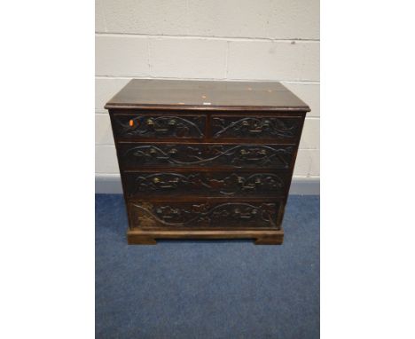 AN 18TH CENTURY OAK CHEST OF TWO OVER THREE LONG GRADUATED DRAWERS, depicting carved vines, leaves and birds to drawer fronts