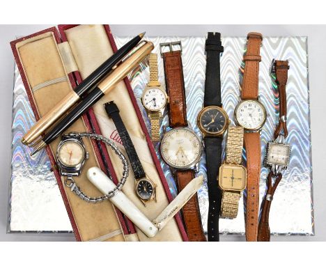 A BOX OF ASSORTED WRISTWATCHES, PENS AND A SILVER FRUIT KNIFE, to include eight wristwatches, such as a gent's 'universal Gen