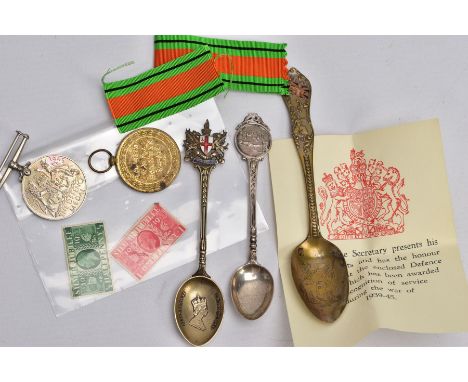 A BAG OF COLLECTABLE SPOONS AND TWO MEDALS, to include a silver teaspoon fitted with an army scene emblem to the handle, hall