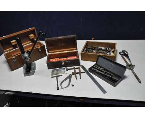 FOUR SMALL BOXES CONTAINING ENGINEERING TOOLS including Imperial Taps and Dies, a Mercer marking stand, bearings, a part Brit