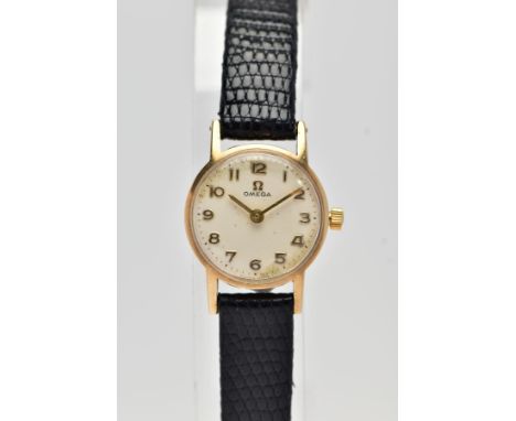 A LADIES 9CT GOLD 'OMEGA' WRISTWATCH, circa 1960's, hand wound movement, round champagne dial signed 'omega', Arabic numerals