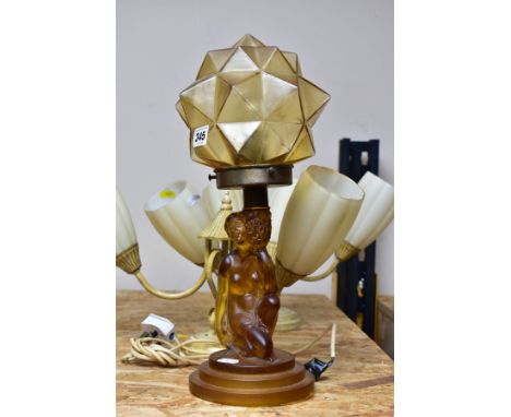 AN ART DECO WALTHER &amp; SOHNE AMBER GLASS TABLE LAMP AND A PAIR OF CEILING LIGHTS, the table lamp with a pale brown geometr