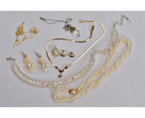 A BAG OF ASSORTED COSTUME JEWELLERY, to include a multi strand cultured pearl necklace fitted with a gold plated mabe pearl s