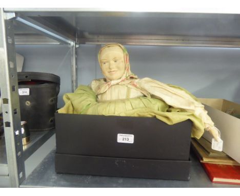 CENTRAL EUROPEAN FABRIC BED DOLL OR TEA COSY, the female figure with moulded and fabric covered head, with printed features, 