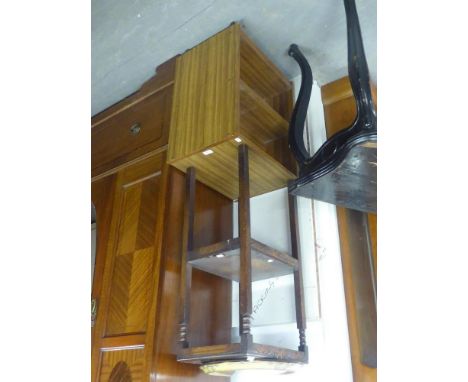 A WOOD EFFECT, DOUBLE SIDE, SQUARE BOOKCASE ON CASTORS, 1'7" WIDE, AN OAK TWO TIER SQUARE JARDINIERE STAND AND A CIRCULAR CON