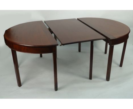 19th CENTURY MAHOGANY DINING TABLE with two D end sections with deep aprons, each on four chamferred straight legs and a gate