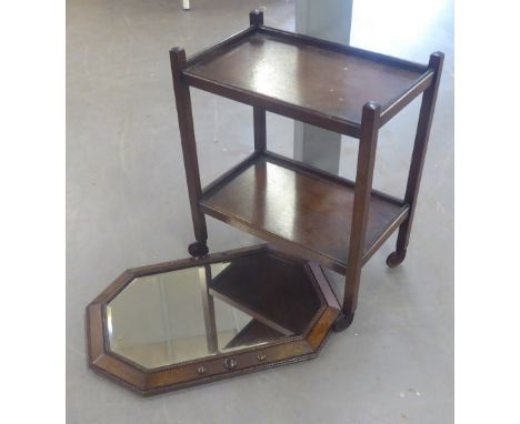 AN OCTAGONAL BEVELLED EDGE WALL MIRROR IN BEADED EDGE OAK FRAME AND AN OAK TWO TIER TEA TROLLEY (2)