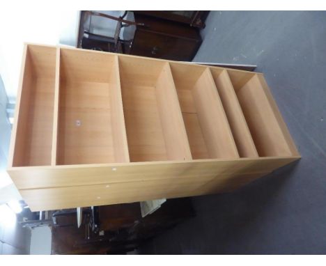 A RANGE OF THREE LIGHT BEECH WOOD OPEN BOOKCASES 