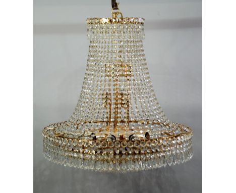IMPRESSIVE MODERN GILT METAL AND CUT GLASS SIXTEEN LIGHT TENT AND BAG TYPE ELECTROLIER, the lower section comprising of six g