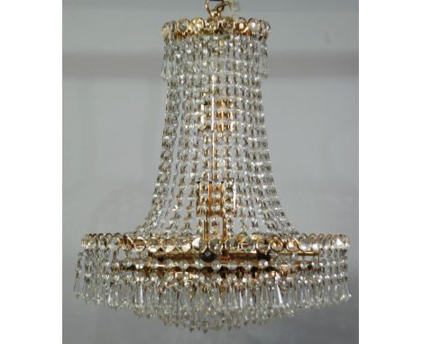 PAIR OF MODERN GILT METAL AND CUT GLASS TEN LIGHT TEN AND BAG TYPE ELECTROLIER'S, en-suite to the previous lot, 24" (61cm) dr