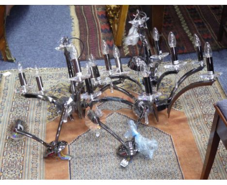 MODERN TITANIUM PLATED BRASS AND FACETED GLASS NINE BRANCH CEILING ELECTROLIER, another matching FIVE BRANCH DITTO and a pair