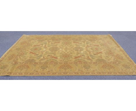 A WASHED CHINESE SMALL CARPET, with en embossed multi coloured Aubusson design, the centre oval floral medallion and principa