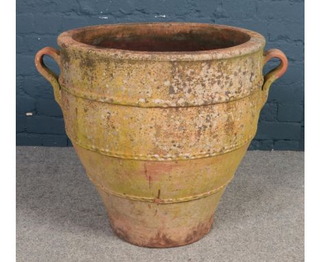 A large terracotta garden planter. (height 61cm, diameter 60cm).  