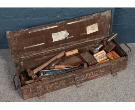 A metal tool case of vintage hand tools. Including hammers, saws, hand crack screwdrivers, wood planes, etc.  