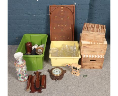 Two boxes of miscellaneous. Including decorative vase, brush set, bagatelle board, wooden storage boxes, etc.  