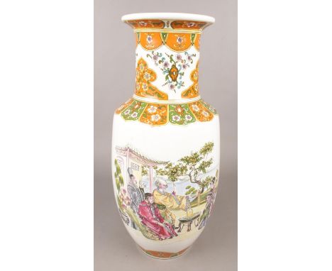 A large ceramic decorative vase. Decorated with figures and flowers. (46cm tall)  